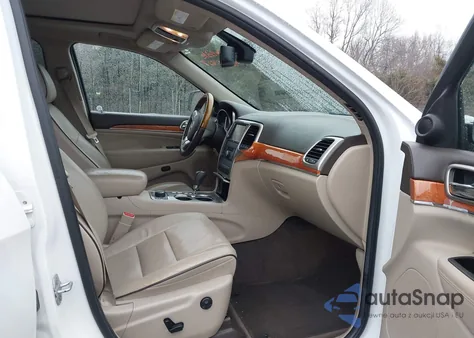 2013 Jeep Grand Cherokee Overland из США, поврежденный, VIN 1C4RJFCGXDC536801